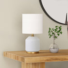 Hudson&Canal Esther 15" Tall Textured Ceramic Table Lamp with Fabric Shade - Matte White/Antique Brass/White-Handcrafted matte white finish is applied to the round ceramic base