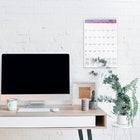 AT-A-GLANCE 2027 Monthly Wall Calendar - 22-3/4" H x 15-1/2" W - Bilingual-Contemporary design with plenty of writing space with full chipboard back. Printed in blue and red ink