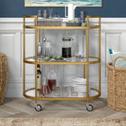 Hudson&Canal Leif 30"W Oval Bar Cart - Brass-Handcrafted brass finish applied to the frame