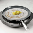 Tramontina Utsava Tri-Ply Clad Stainless Steel Ceramic Nonstick Dosa Tawa-Versatile Use: Works on all cooktops, including induction, and is oven-safe up to 400Â°F for flexible cooking