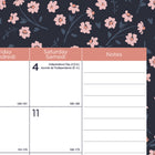 Blueline 18 Months Monthly Academic Desk Pad - July 2026 to December 2027 - 22" L x 17" W - Blossom Design - Bilingual-Reference calendar, notes, numbered weeks, Julian dates, holidays, moon phases