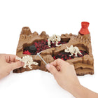 Kinetic Sand Digging for Dinos Dino Dig-Build 3 dinosaur skeletons: Assemble your fossil treasures into 3 different collectible dinosaur toy figures! Piece together your own triceratops, stegosaurus and tyrannosaurus rex skeletons!