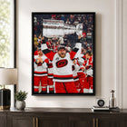 Frameworth Nikolaj Ehlers 20" H x 29" W Framed Canvas Carolina Hurricanes 2026 Stanley Cup Champions Framed - Officially Licensed NHL/NHLPA-Professionally framed in Canada: The image is printed on high-quality art canvas, professionally stretched, and presented in a premium black frame