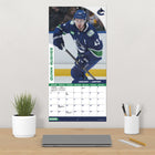 DateWorks 2026 16-Month Wall Calendar - 12" x 12" - Vancouver Canucks Superstars - Bilingual-Features monthly pages for January to December 2026, as well as the last 4 months of 2025