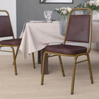 Flash Furniture HERCULES Series Trapezoidal Back Stacking Banquet Chair in Brown Vinyl - Gold Frame-Upholstered Seat and Back