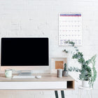 AT-A-GLANCE 2027 Monthly Wall Calendar - 17" H x 12" W - Bilingual-Contemporary design with plenty of writing space with full chipboard back. Printed in blue and red ink