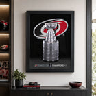 Frameworth Carolina Hurricanes 16" H x 20" W Frame 2026 Stanley Cup Champions Framed Wall Art 16" x 20" W Frameworth - Officially Licensed NHL/NHLPA-Professionally framed in Canada: The image is printed on high-quality photo paper and professionally finished in a black frame with a clear protective front