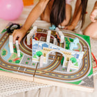 Melissa & Doug 18-Piece Wooden Take-Along Tabletop Town - 4 Rescue Vehicles, Play Pieces, Bridge-Includes 4 wooden vehicles to race to the rescue around town: police car, ambulance, fire engine, helicopter