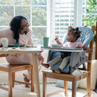Ingenuity Proper Positioner 7-in-1 Deluxe High Chair - Chambray-The faux wood print on the seat's metal legs complements home décor