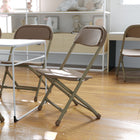 Flash Furniture Kids Brown Plastic Folding Chair - 10 Pack-220 lb. Weight Capacity
