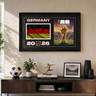 Frameworth Official FIFA World Cup 2026 Germany Flag & Trophy Framed Print - 15" x 24"-Professionally framed in Canada, printed on high-quality photo paper and finished in a premium black frame with a clear protective front.