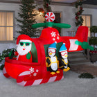 GEMMY Airblown Inflatable Christmas Animated Helicopter with Sky Diving Penguins - 76" x 53"-Includes stakes and tethers