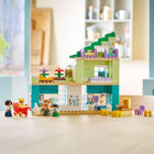 LEGO DUPLO Town 3 in 1 Modern Family House with Figures-Includes a baby bottle, stroller, toilet, fridge, and a roof garden with insect hotel
