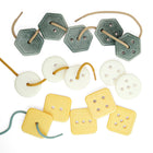 Yellow Door Count & Thread Stones Set-Each set includes 15 tactile stones (measuring 2") and three soft, chunky laces.