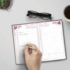 Brownline 2027 Daily Planner with Perfect Binding and Rigid Lizard-Like Cover - 8" x 5" - Black-Certified under FSC license code: FSC C102682. The Forest Stewardship Council enables businesses and consumers to choose products made with materials sourced from responsible forestry, promoting environmentally appropriate, socially beneficial, and economically viable management of the world's forests