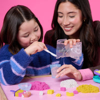 Kinetic Sand Smoothie Mixer Playset-Make smoothies & popsicles: Kids can create their own pretend play kitchen adventures as they craft fruity treats with 14 oz of pink, yellow & white Kinetic Sand, a mixer that really mixes sand, smoothie cup, popsicle mold & more
