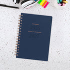 AT-A-GLANCE 2026-2027 Signature Weekly/Monthly Academic Planner - 8-1/2" H x 5-3/8" W - Navy - Bilingual-Special pages include a holiday list, 3 year reference calendar, event calendar, contacts, and notes pages