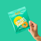 Smart Sweets Peach Rings - 50 g -Ingredients: Non-GMO isomalto-oligosaccharides (vegetable source), Water, Modified potato starch, Chicory root fibre, Rice flour, Malic acid, Pectin, Citric acid, Lactic acid, Fumaric acid, Stevia leaf extract, Pumpkin, carrot, and apple preparation (for colour), Natural flavours, Modified coconut oil, Carnauba wax