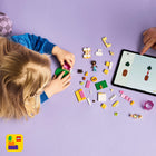 LEGO 42665 Friends Puppy Playground Building Toy-Encourages nurturing play: Kids practice caring skills as they help Aliya and Sara navigate take care of the puppies by playing fetch with the ball, feeding biscuits and a bone, and  cleaning up giggle-inducing pretend puppy poop