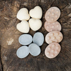 Yellow Door Finger Fidget Stones 12-Piece Set-Each set includes twelve stones, four each of three designs (heart, knobbly and hollowed).