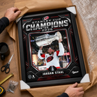 Frameworth Carolina Hurricanes 2026 Stanley Cup Champions: Jordan Staal Shield Design PhotoGlass Framed Photo - 18" W x 22" H-Frameworth quality: Made in Canada by Frameworth Sports Marketing, established 1992, producing officially licensed sports memorabilia