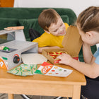Melissa & Doug Top & Bake Wooden Pizza Counter Play Set - 41 Pieces-Ingredients include cheese shaker, felt sauce and cheese, wooden crust, and toppings; pieces stick with self-stick tabs