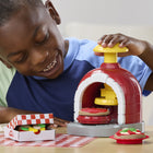 Play-Doh Stamp & Spin Pizza Playset-Add over 25 wacky toppings: Sprinkle silly cheese with the grater and create make-believe meats and veggies with the variety of built-in molds on the kitchen playset 