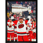 Frameworth Nikolaj Ehlers 20" H x 29" W Framed Canvas Carolina Hurricanes 2026 Stanley Cup Champions Framed - Officially Licensed NHL/NHLPA-Officially licensed NHL and NHLPA wall art: Nikolaj Ehlers 20x29 Framed Canvas Carolina Hurricanes 2026 Stanley Cup Champions for Carolina Hurricanes fans and collectors