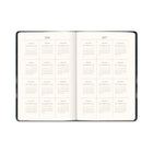 Orange Circle Studio Midnight Skies Medium Casebound Weekly/Monthly Planner -  5.7" x 8.2" - Assorted Colours - Bilingual-Showcases sophisticated artwork throughout interior