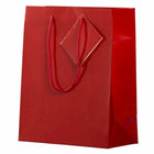 JAM Paper Glossy Gift Bags with Rope Handles - Medium - 8" x 4" x 10" - Red - 100 Pack-Quantity: 100 per pack, Sturdy construction allows for you to fold and reuse bags later.