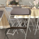 Flash Furniture HERCULES Series Premium Brown Plastic Folding Chair-Brown Powder Coated Frame Finish