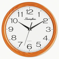 Swingline 12" Woodgrain Round wall Clock-Perfect for any setting, this 12" wall clock features a stylish faux-wood finish that accents traditional or modern settings with functional style