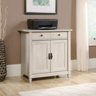 Sauder Edge Water Utility Stand, Chalked Chestnut-Hidden storage behind doors features large adjustable shelf