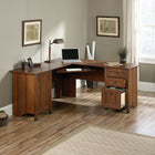 Sauder 66"W Carson Forge Corner Computer Desk - Washington Cherry- This l shaped desk fits nicely into a corner, giving you plenty of work space and storage