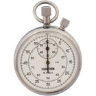 Chronomètre mécanique, arrêt intermédiaire-Le remontoir mécanique est doté de deux boutons – le bouton supérieur est la couronne du remontoir et permet à l’utilisateur de démarrer et d’arrêter le chronomètre, le bouton latéral permet à l’utilisateur de chronomètre de ramener l’aiguille à zéro lorsque le chronomètre est arrêté