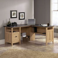 Sauder 59"W August Hill L-Desk - Dover Oak-File drawer with full extension slides holds letter-size hanging files