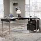 Sauder 60"W Walter Heights L-Desk - Blade Walnut-Plenty of storage offering a lower drawer with full extension slides that holds letter-size hanging files