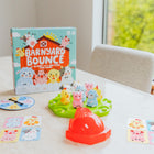 Educational Insights Barnyard Bounce Game - Multicolor-How to play - Players pick an animal card, then take turns pressing the Highflyer to launch an animal at random. The first player to fill their card with matching animals wins the round