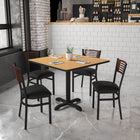 Flash Furniture HERCULES Series Black Slat Back Metal Restaurant Chair - Walnut Wood Back, Black Vinyl Seat-Welded Joint Assembly