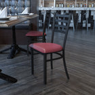 Flash Furniture HERCULES Series Black Ladder Back Metal Restaurant Chair - Burgundy Vinyl Seat-Welded Joint Assembly