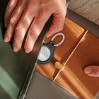 Belkin Secure Airtag Holder with Key Ring - Black-This AirTag case keychain firmly grips the edges of your AirTag while keeping personalized engravings visible in a high-quality, elegant accessory.