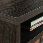 Sauder 57"W Canton Lane L-Desk - Grand Walnut-Cord management includes two desktop grommets to reduce cord clutter.