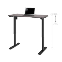Bestar 24" x 48" Electric Height Adjustable Table, Slate, (65857-59)-Durable 1" commercial grade work surface with melamine finish that resists scratches, stains and burns.