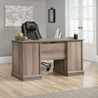 Sauder 59"W Barrister Lane Executive Desk - Salt Oak-Two drawers feature metal runners and safety stops to store office desk essentials