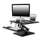 Heartwood 100-DTHA Sit-To-Stand Adjustable Height Desk Riser, Black-Composite wood platform and base is covered by PVC laminate in textured Black finish, complemented with a aluminum diecast metal frame in gun-metal grey.