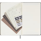 Moleskine Undated Weekly Planner - 12 Month - Large - Black - Hard Cover - 5" x 8.25"-Colour-coordinated expandable inner pocket