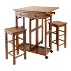 Winsome Space Saver with 2 Stools, Square, Teak-The set includes a table with drop leaf and two stools