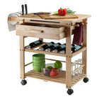 Winsome Finland Kitchen Cart-Comes with Knife Block and holds 4 bottles of Wine.  Solid/Composite Wood.  Assembly Required.