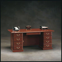 Sauder Heritage Hill Executive Desk-This executive office desk has three file drawers with full extension slides that hold letter, legal or European size hanging files