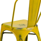 Flash Furniture Commercial Grade Distressed Metal Indoor-Outdoor Stackable Chair - Yellow-Cross Brace under seat provides extra stability